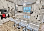 Beautiful large gourmet kitchen with seating for 4
